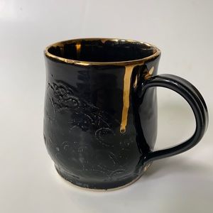 Hand made pottery mug, lace imprint, gold edging